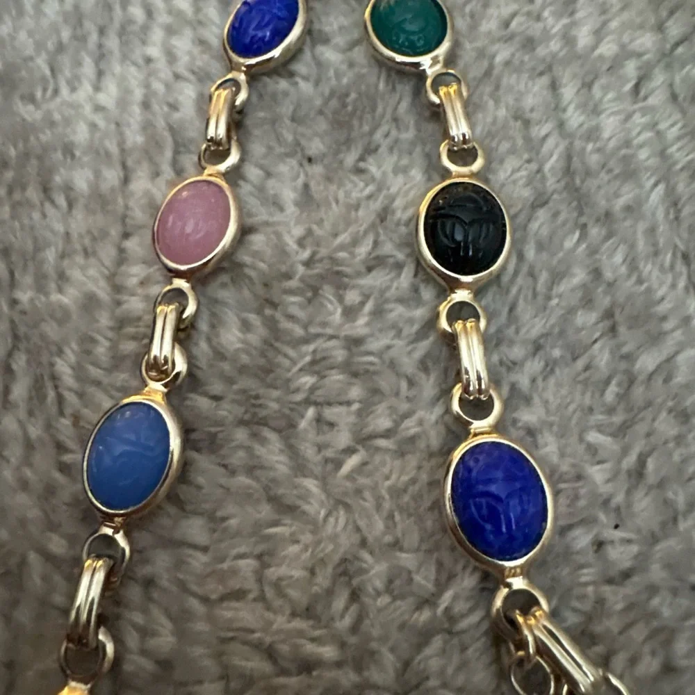 EUC multi stone gold tone bracelet
